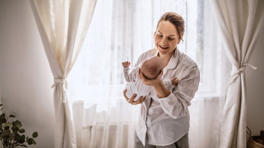 Postnatal Depression PND, mother holding baby